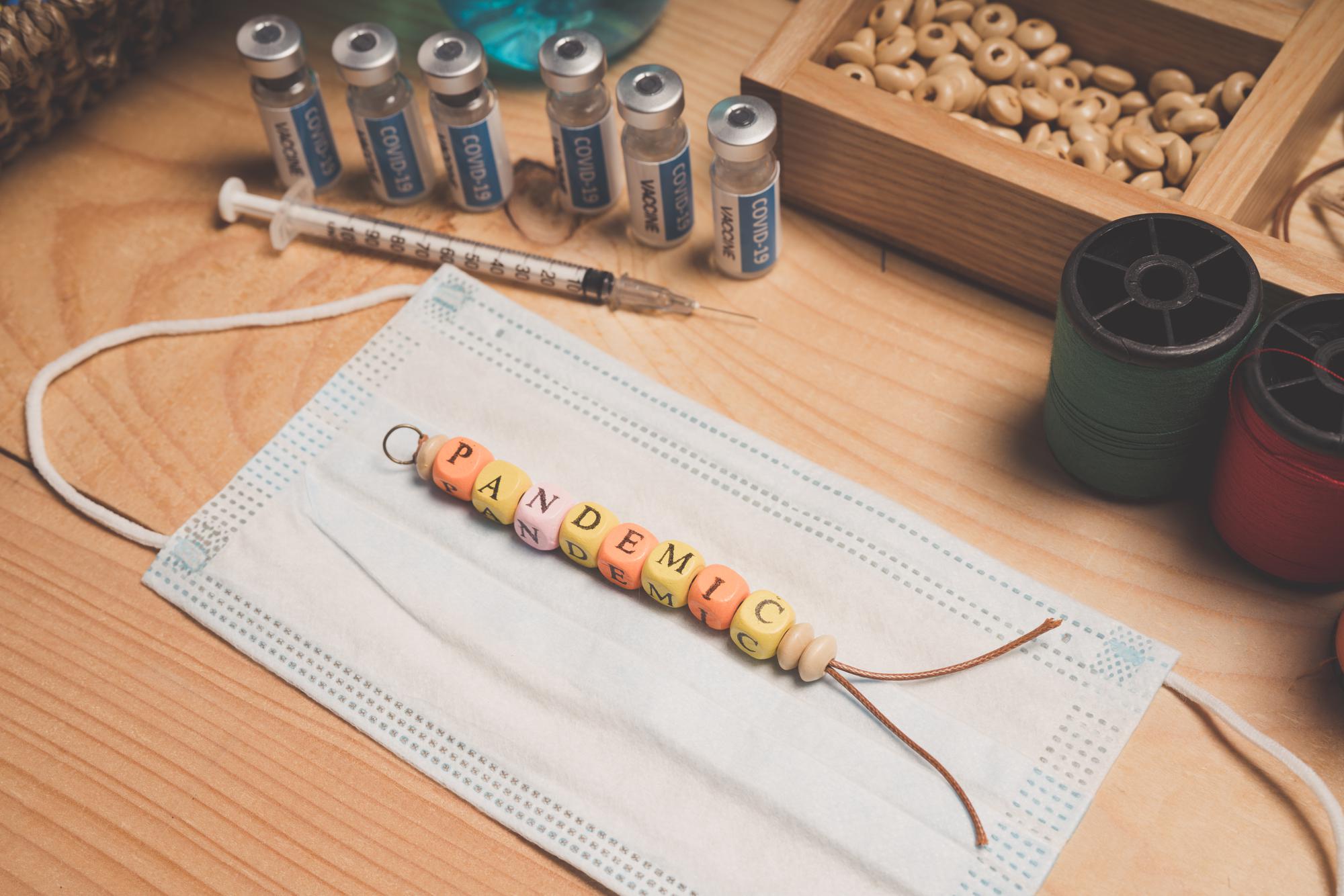 Close-up of satin stitch lettering in progress